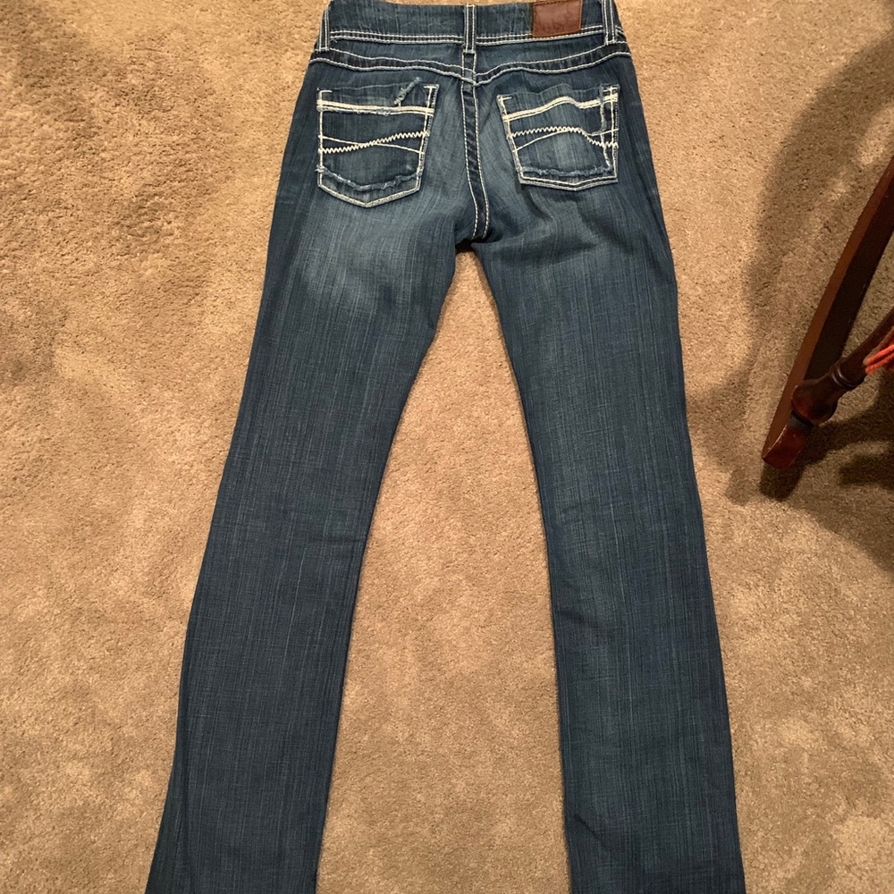 BKE boot cut jeans, low rise. Medium wash.